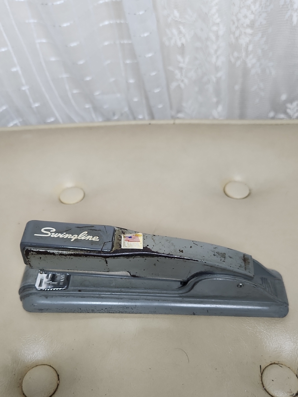 intage gray Swingline No. 27 stapler with a metal body